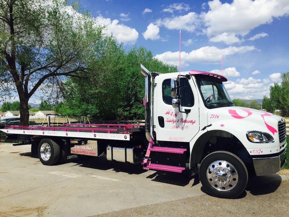 M&H Towing and Recovery's Breast Cancer Awareness Tow Truck serving Montrose Colorado